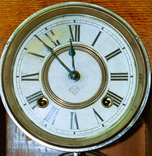 Dial of Ansonia oak kitchen clock
