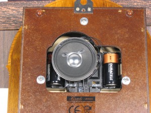 A clock with the speaker mounted to the back of the movement (Hermle 70883-Q12214). The sound is not as good when the speaker is mounted this way.