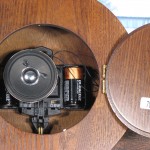 A clock with the speaker mounted to the back of the movement, and in which the back door covers the speaker, trapping the sound inside (Hermle 70734-Q12214). This causes the chime to be very quiet and without richness.