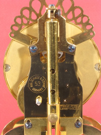 The back of the movement, showing the date code of 5 56 (May 1956)