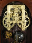 Gilbert 8 day time and strike movement. Note the stopworks gears (the star-like gears) on the winding arbors.