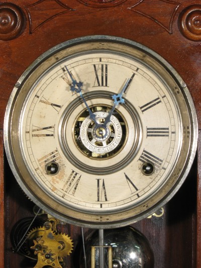 Original dial and hands. The disc in the center is for setting the alarm.