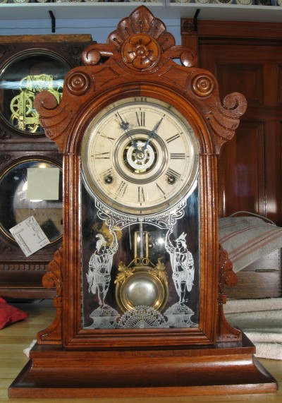 Gilbert "Parole" walnut shelf or parlor clock. 19 1/4 inches tall.