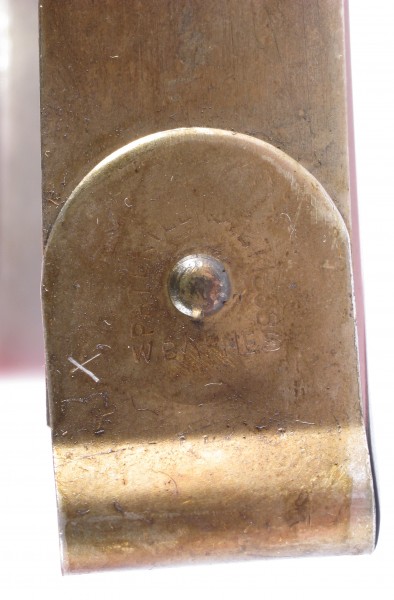 Barnes patented mainspring 0.018 inch thick (from Gilbert walnut shelf clock, time side)