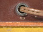Date code 4712 on the metal rear cover beneath the power cord.