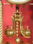IMG_7275 Earlier type of mounting nuts (long). Earlier type of pendulum (has slots in upper part of arms).