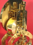 On the left is the large mainspring barrel, capable of running the clock for about 3 years on one winding.