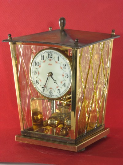 Kundo miniature 400 day clock, 8 1/ 4inches tall.