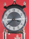 Dial with numerals on white painted chapter ring. Nickel plated bezel.