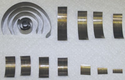 15 pieces of the broken mainspring