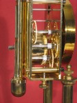Side view of movement, suspension guard and gears.