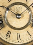The Waterbury logo. Says "Waterbury Clock Co." at the bottom
