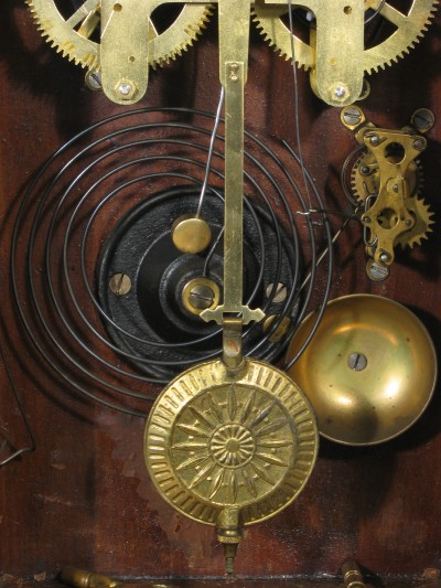 Showing the pendulum, gong and and the alarm unit.