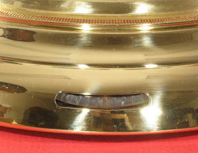 Showing one of the clean leveling discs in place on the base.