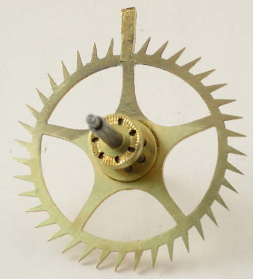 Plug inserted in the escape wheel