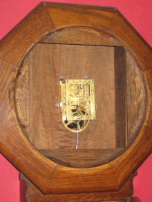 The movement is mounted crooked in the case.